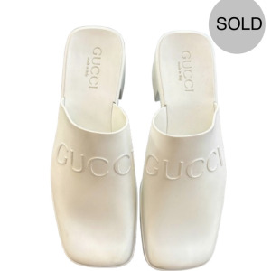 GUCCI LOGO EMBOSSED RUBBER MULES SIZE 35